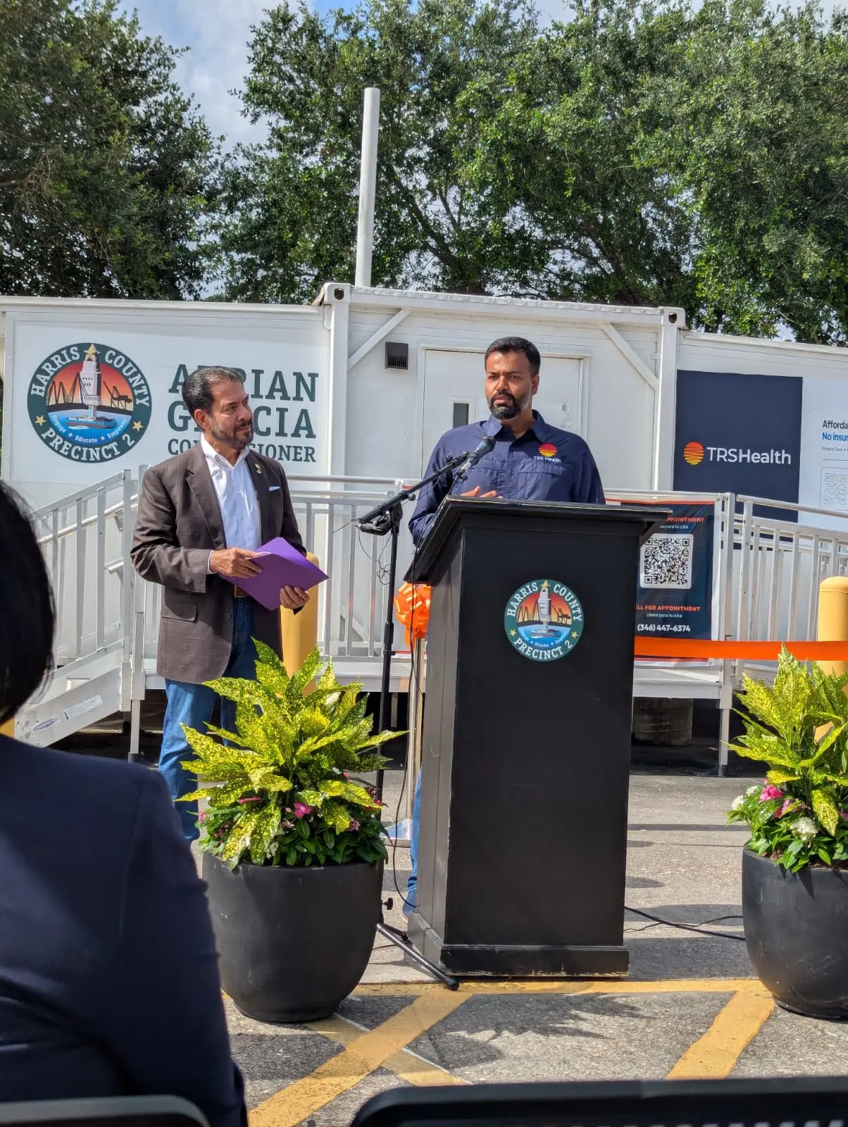 TRS Health Executive Director Shaida Hussain speaking at the Access2Health ribbon cutting