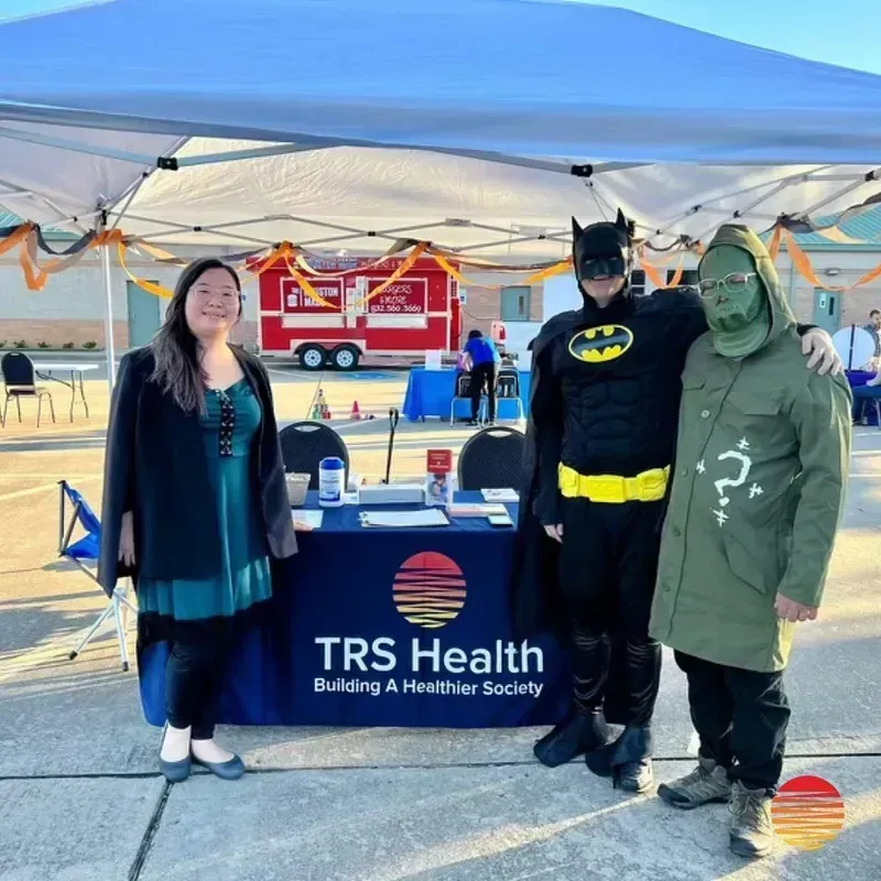TRS Health volunteer at a community health event in Houston