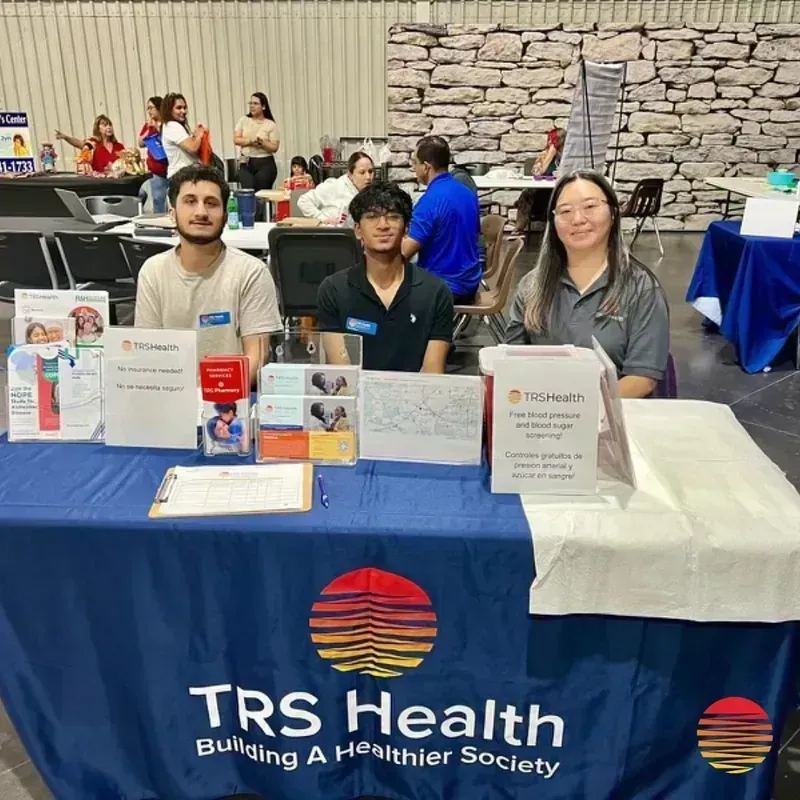 TRS Health volunteer at a community health event in Houston