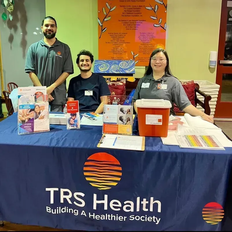 TRS Health volunteer at a community health event in Houston
