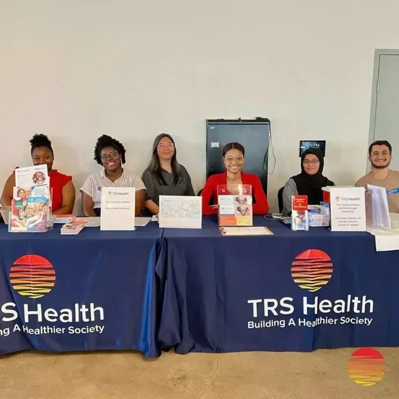 TRS Health volunteer at a community health event in Houston